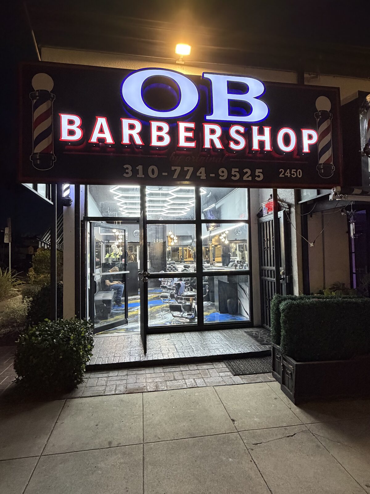 OB Barbershop storefront on Overland Ave